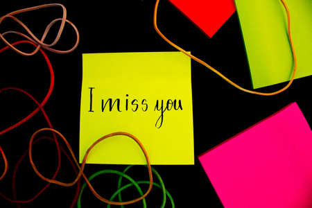 A colorful note saying "I miss you"の写真素材