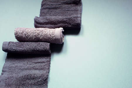 Towels on a blue background, close-up, copy spaceの写真素材