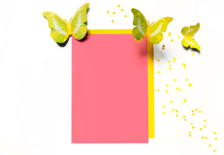 Postcard with butterflies and confetti on white background, flat lay. Space for textの写真素材