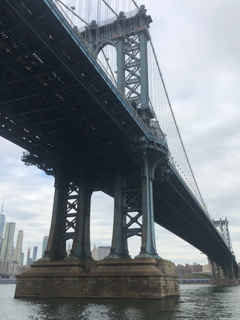 View of Downtown Manhattan from underneath of the Manhattan Bridge, New York City, United States of America.の写真素材