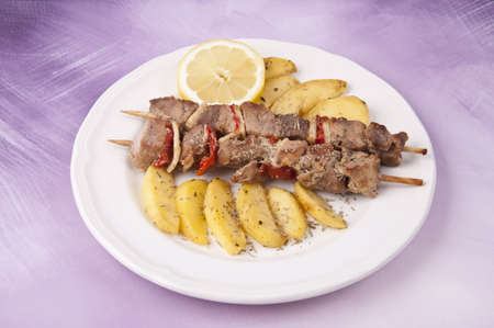 turkey kebabs with potatoesの写真素材