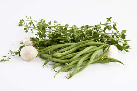 green beans with mint and garlic on a white background
