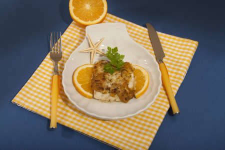 Nile perch fillet with orangeの写真素材