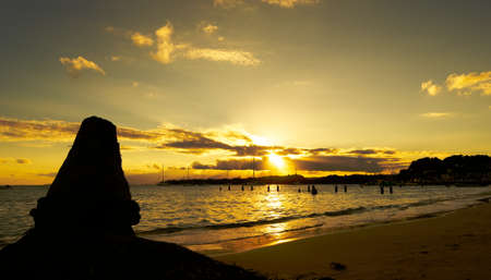 Sunset in tropical beach of Sainte Anne - Caribbean Sea - Guadeloupe tropical islandの写真素材