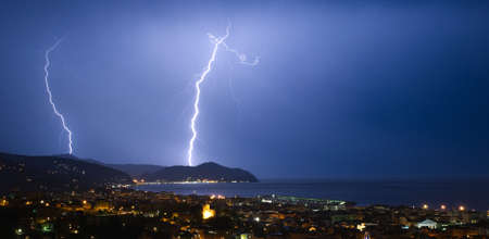 Lightning and thunderstorms on the Tigullio Gulf - Ligurian Sea - Chiavari - Italyの写真素材