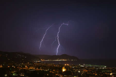 Lightning and thunderstorms on the Tigullio Gulf - Ligurian Sea - Chiavari - Italyの写真素材