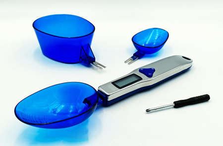 Digital kitchen scales and accessories, isolated on white backgroundの写真素材