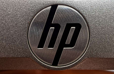Black HP logo on aluminum background. Illustrative editorial photoのeditorial素材