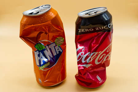 Empty and crushed Coca Cola and Fanta can