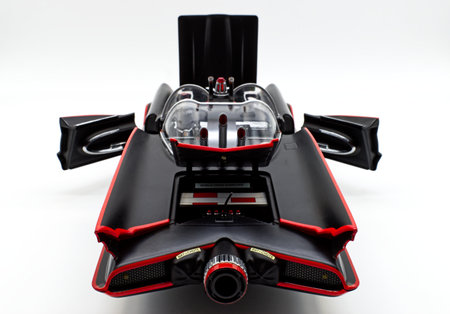 Batmobile diecast isolated on white background. Batmobile replica in 1:18 scale from 1966 Batman Tv...