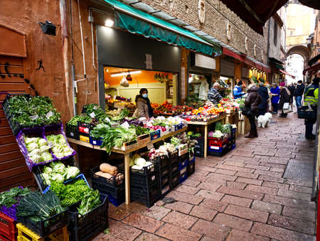 Famous street market "Il Quadrilatero" located in the center of Bologna, Italy, animated by commercial tradition dating back to the Middle Ages.のeditorial素材