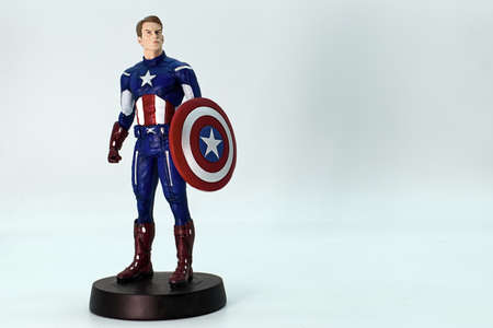 Captain America action figure isolated on white background. Superheroes Comic books by Marvel. Empty...