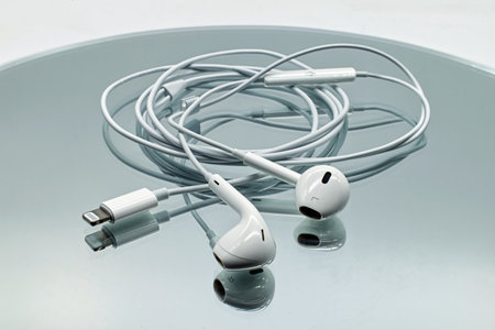 Apple Ear Pods with lightning connector developed by Apple Inc.のeditorial素材