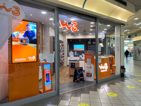 Windtre telecommunications company retail store in Bologna. Italyのeditorial素材