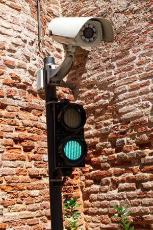 Site entry traffic lights with camera. Cittadella, Padua, Italy