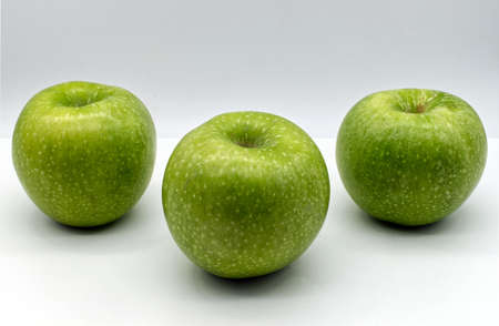 Fresh "Granny Smith" Apples cultivar isolated on white backgroundの写真素材