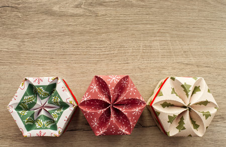 Christmas gifts box on wooden background. Top view with copy space for your text