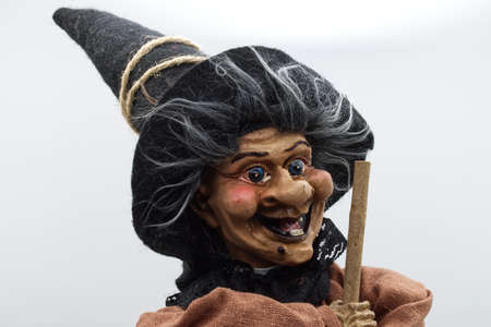 The Befana on white background. Traditional witch costume for Italian Epiphany day.の写真素材