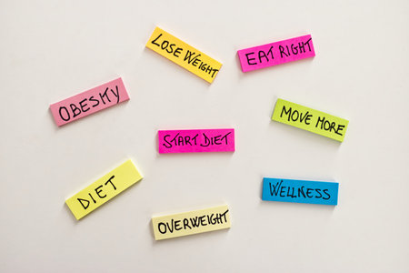 Colorful stickers with Diet text and keywords. Sticky notes posted on white background with Diet and...