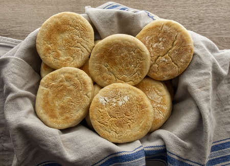 Delicious Italian Tigelle on wooden background. Traditional dish from Emilia-Romagna region. Bologna, Italyの写真素材