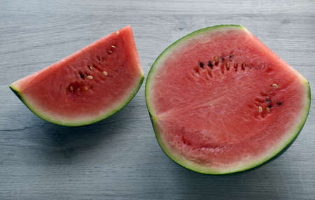 Fresh watermelon isolated on wooden table.の写真素材