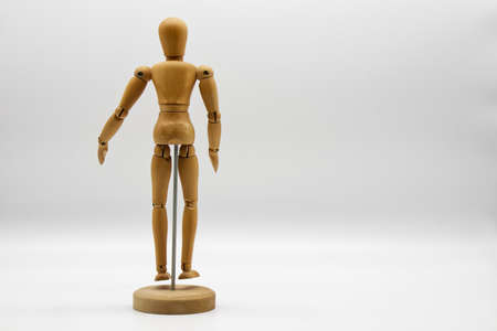 Wooden figure isolated on white background. Wood Figure Mannequin. Space for text.の写真素材
