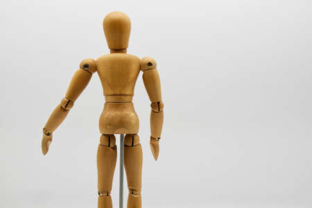 Wooden figure isolated on white background. Wood Figure Mannequin. Space for text.の写真素材