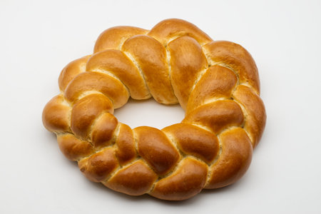 Traditional Italian bread Corona di Pasqua (Easter wreath) isolated on white background.の写真素材