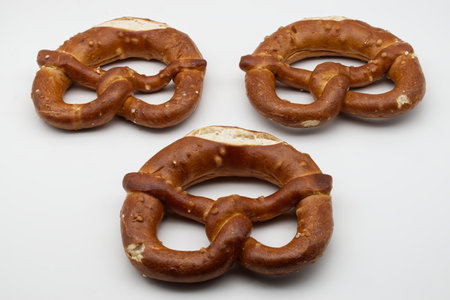 Brezel, also known as a pretzel, is a type of baked bread product often associated with German cuisine.の写真素材