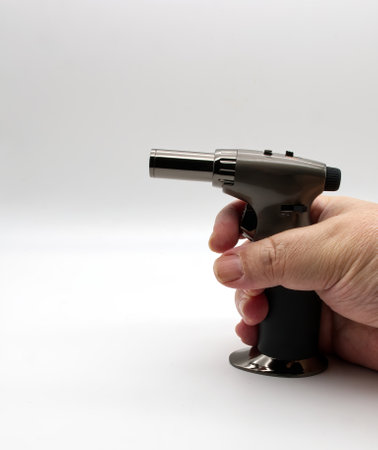 Flamethrower for kitchen isolated on white background.の写真素材