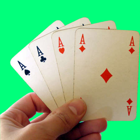 Game of cards with poker of aces