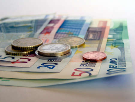 Euro banknotes and coinsの写真素材