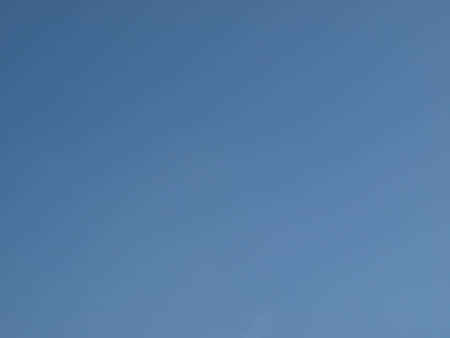 Blue sky with clouds backgroundの写真素材