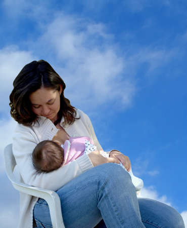 pretty young mum breastfeeding her baby