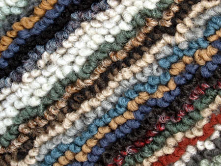 Carpet mat rug with multi coloured stripesの写真素材