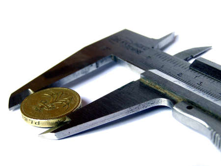 Calliper measuring tool isolated over white backgroundの写真素材