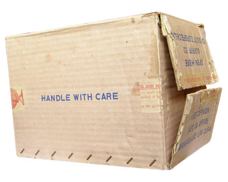 Corrugated cardboard parcel packet isolated over white