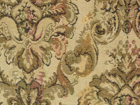 Ancient medieval embroidered textile backgroundの写真素材