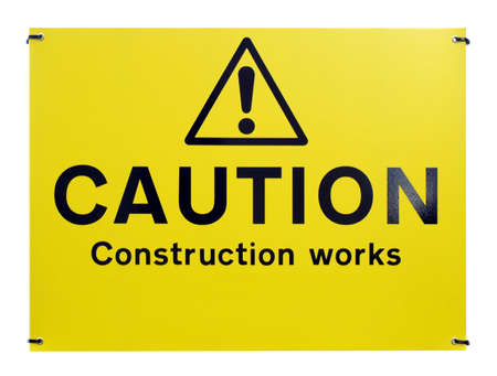 Caution construction works sign isolated on whiteの写真素材