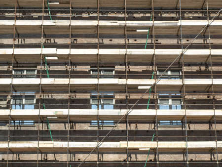 Temporary scaffold for construction works in building siteの写真素材