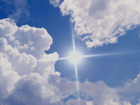 Deep blue sunny sky with white cloudsの写真素材