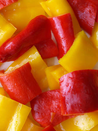 Red and yellow peppers useful as a food backgroundの写真素材