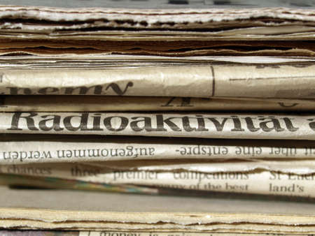 Detail of a pile of international newspapersの写真素材