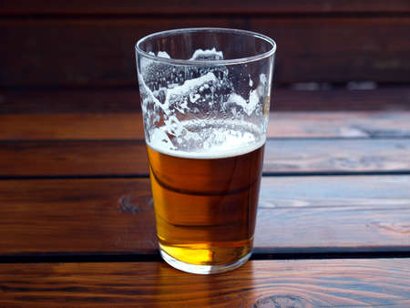 Large glass pint of beer alcoholic drinkの写真素材