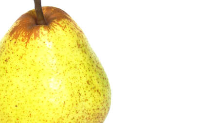 A pear fruit over a white backgroundの写真素材