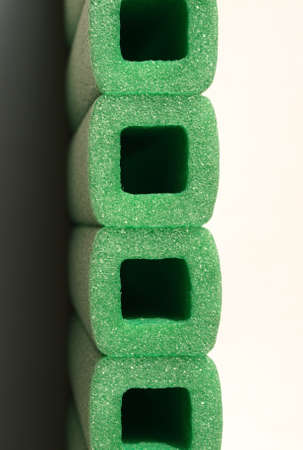 Green soft polypropylene pillow useful as a backgroundの写真素材