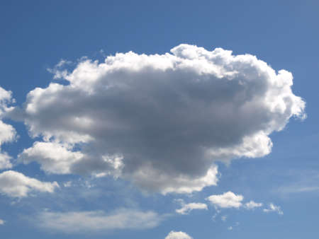 Blue sky with white clouds useful as a backgroundの写真素材
