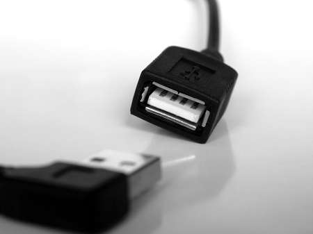 Detail of an USB plug and socketの写真素材