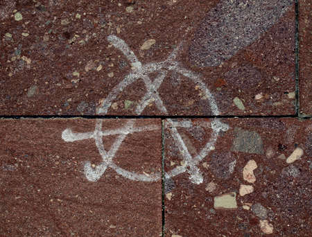 Symbol of Anarchy painted on a wallの写真素材