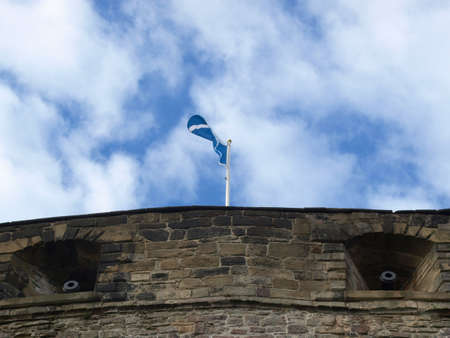 Flag of Scotland on the Edinburgh Castleの写真素材